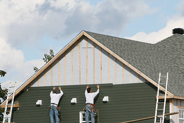 Professional Storm Damage Siding Repair technician working in Pleasant Plain, OH